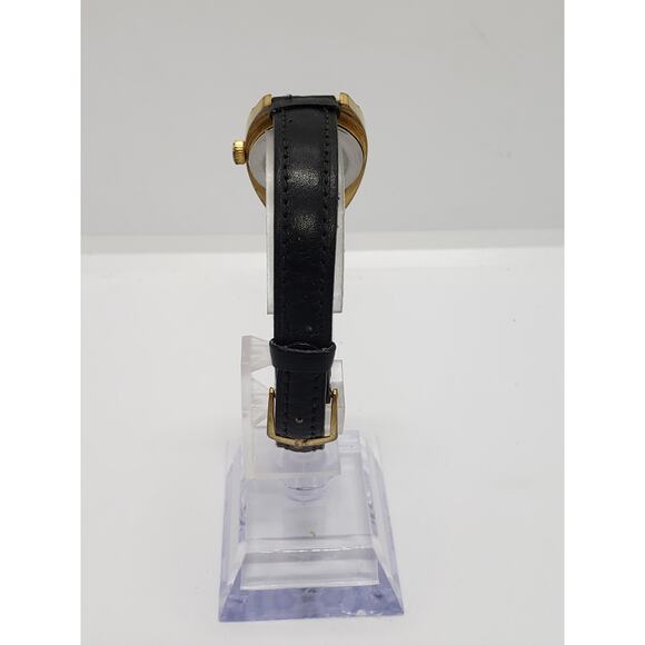 Timex Women\'s watch. Silver face, gold bevel. Dress watch